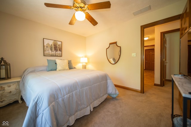 7732 Ashtree Dr, Indianapolis, IN 46259 - bedroom with baseboards, a ceiling fan, visible vents, and light colored carpet