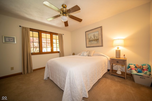 7732 Ashtree Dr, Indianapolis, IN 46259 - bedroom with ceiling fan, carpet floors, and baseboards
