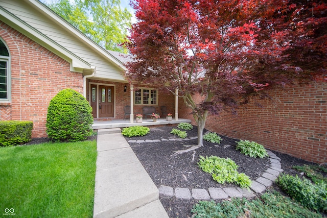 7732 Ashtree Dr, Indianapolis, IN 46259 - doorway to property with brick siding