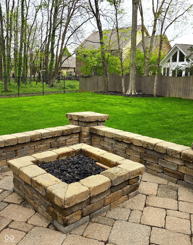 7732 Ashtree Dr, Indianapolis, IN 46259 - view of yard with a fenced backyard and a fire pit