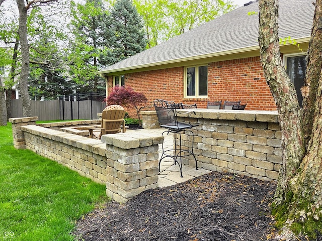 7732 Ashtree Dr, Indianapolis, IN 46259 - view of patio / terrace with fence and outdoor dry bar