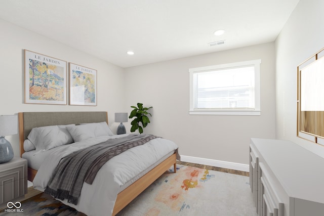 240 E Caven St E, Indianapolis, IN 46225 - bedroom with baseboards, visible vents, recessed lighting, and light wood finished floors