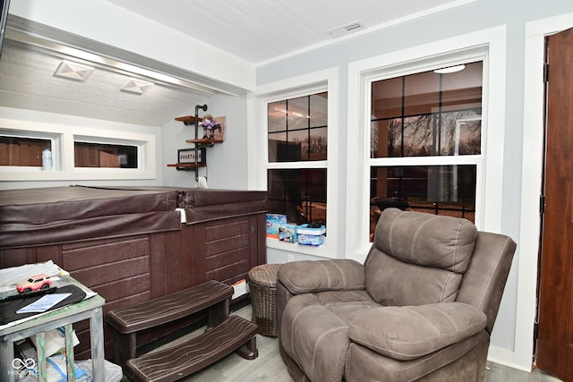 3041 S Kercheval St, Indianapolis, IN 46239 - living area with wood finished floors and visible vents