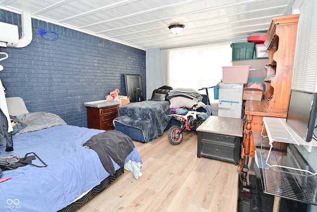 3041 S Kercheval St, Indianapolis, IN 46239 - bedroom featuring wood finished floors and brick wall