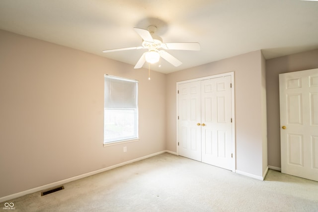 11229 Echo Ridge Ln, Indianapolis, IN 46236 - unfurnished bedroom featuring light colored carpet, a closet, and ceiling fan