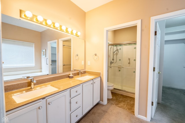 11229 Echo Ridge Ln, Indianapolis, IN 46236 - bathroom featuring a shower stall, double vanity, and a walk in closet