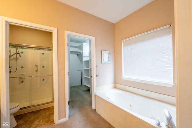 11229 Echo Ridge Ln, Indianapolis, IN 46236 - bathroom featuring a tub with jets, a tile shower, and a walk in closet