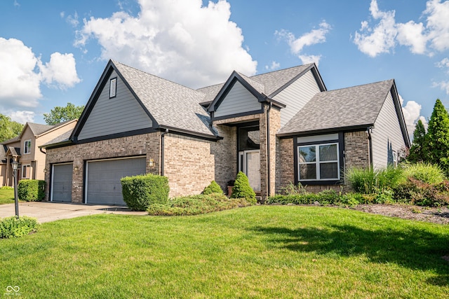 11229 Echo Ridge Ln, Indianapolis, IN 46236 - view of front of property featuring an attached garage, brick siding, concrete driveway, a front lawn, and a shingled roof