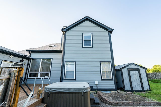 11229 Echo Ridge Ln, Indianapolis, IN 46236 - back of property featuring a hot tub, a shed, and a wooden deck