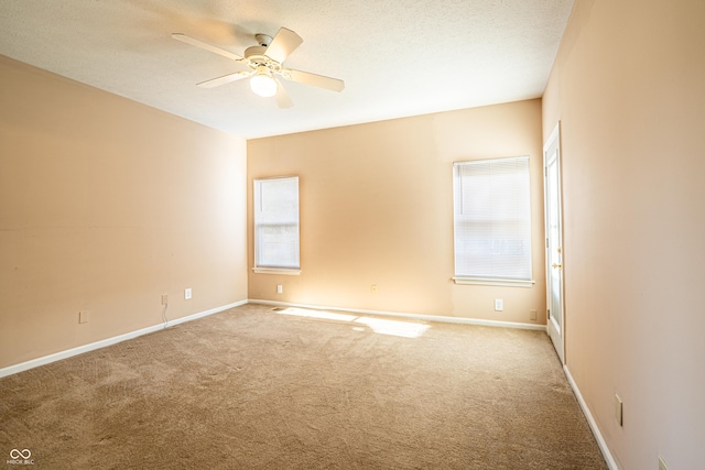 11229 Echo Ridge Ln, Indianapolis, IN 46236 - spare room featuring carpet, ceiling fan, and a textured ceiling
