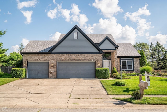 11229 Echo Ridge Ln, Indianapolis, IN 46236 - view of front facade with concrete driveway, an attached garage, a shingled roof, and brick siding