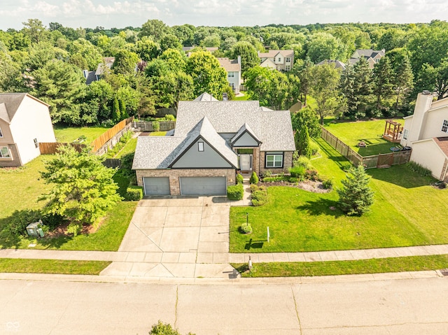 11229 Echo Ridge Ln, Indianapolis, IN 46236 - view of front of house with driveway, a garage, brick siding, and a shingled roof