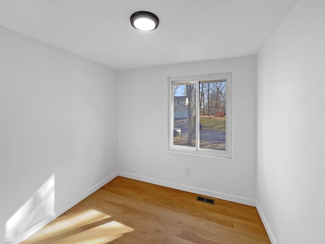 2928 Sheffield Dr, Indianapolis, IN 46229 - empty room with wood finished floors and baseboards