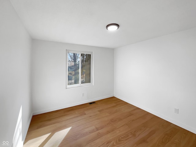 2928 Sheffield Dr, Indianapolis, IN 46229 - empty room featuring wood finished floors and baseboards