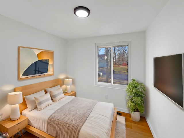 2928 Sheffield Dr, Indianapolis, IN 46229 - bedroom with wood finished floors and baseboards
