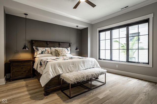 12099 Sigillary Way, Carmel, IN 46032 - bedroom featuring light wood finished floors, crown molding, and a ceiling fan