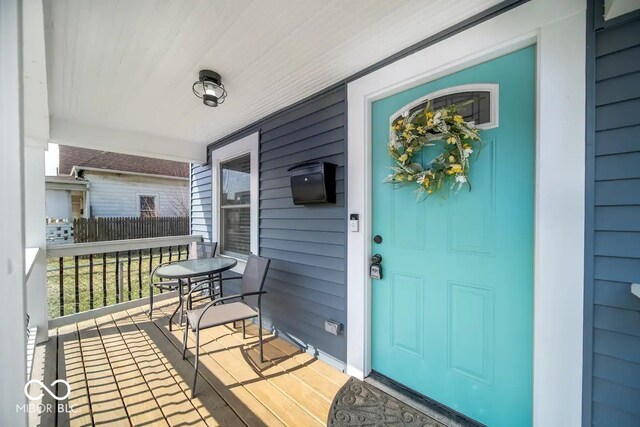1444 English Ave, Indianapolis, IN 46201 - view of exterior entry with a porch