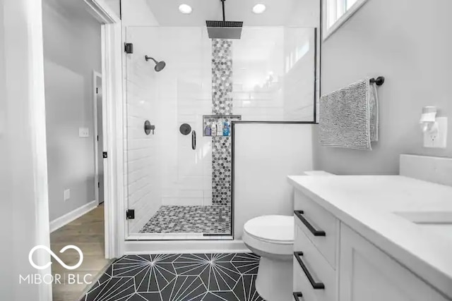 1444 English Ave, Indianapolis, IN 46201 - full bath featuring a shower stall, vanity, recessed lighting, toilet, and baseboards