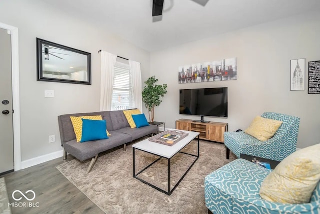 1444 English Ave, Indianapolis, IN 46201 - living room with baseboards, wood finished floors, and ceiling fan