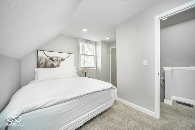 1444 English Ave, Indianapolis, IN 46201 - carpeted bedroom with visible vents, baseboards, recessed lighting, and vaulted ceiling