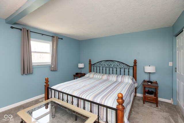 251 Howard Rd, Greenwood, IN 46142 - bedroom with baseboards, a textured ceiling, and carpet
