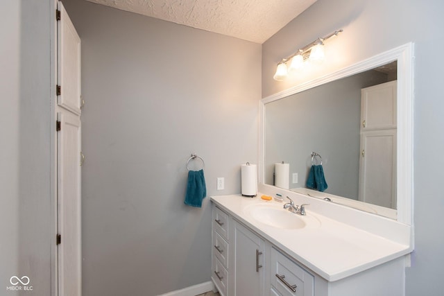 251 Howard Rd, Greenwood, IN 46142 - bathroom with a textured ceiling and vanity