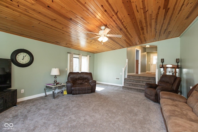 251 Howard Rd, Greenwood, IN 46142 - living area with carpet floors, wooden ceiling, baseboards, and stairway