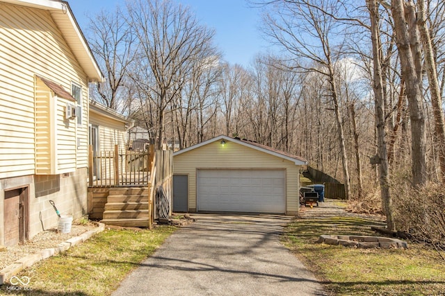 251 Howard Rd, Greenwood, IN 46142 - view of home's exterior with an outbuilding and a garage