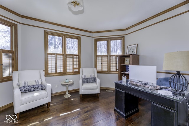 office featuring baseboards, ornamental molding, dark wood-type flooring, and a healthy amount of sunlight