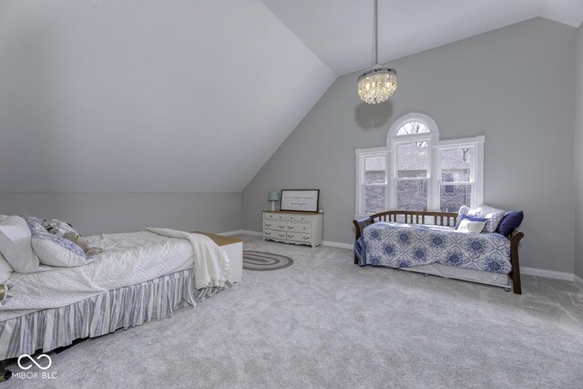bedroom with carpet flooring, an inviting chandelier, baseboards, and lofted ceiling