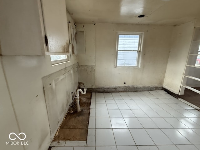 empty room featuring plenty of natural light