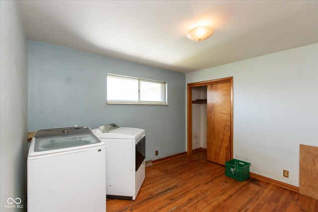 817 Shadowlawn Ave, Greencastle, IN 46135 - washroom with laundry area, washing machine and clothes dryer, baseboards, and hardwood / wood-style flooring
