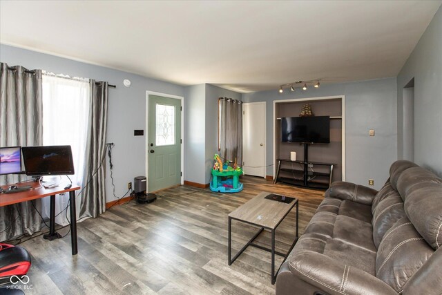 817 Shadowlawn Ave, Greencastle, IN 46135 - living area with baseboards and wood finished floors