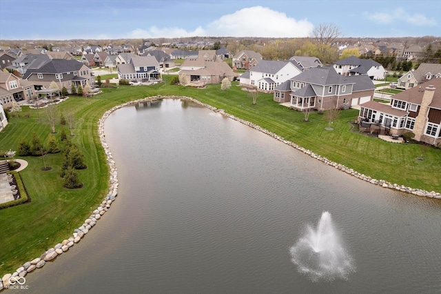 aerial view featuring a water view and a residential view