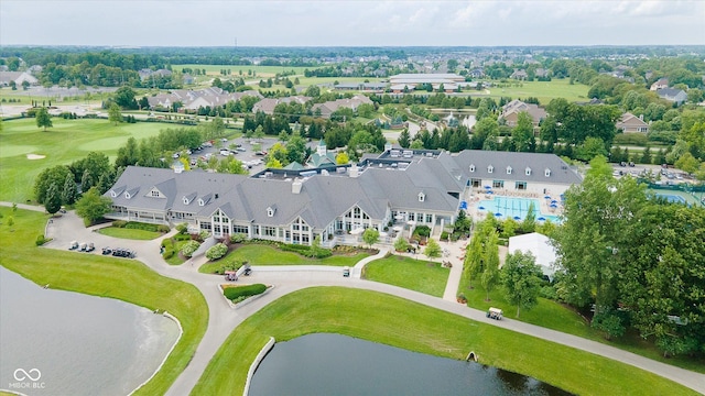 bird's eye view with view of golf course and a water view