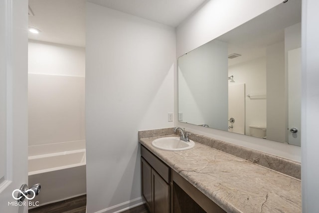 1924 White Oak Dr, Shelbyville, IN 46176 - full bathroom with vanity and wood finished floors