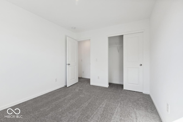 1924 White Oak Dr, Shelbyville, IN 46176 - unfurnished bedroom with baseboards, carpet, and a closet