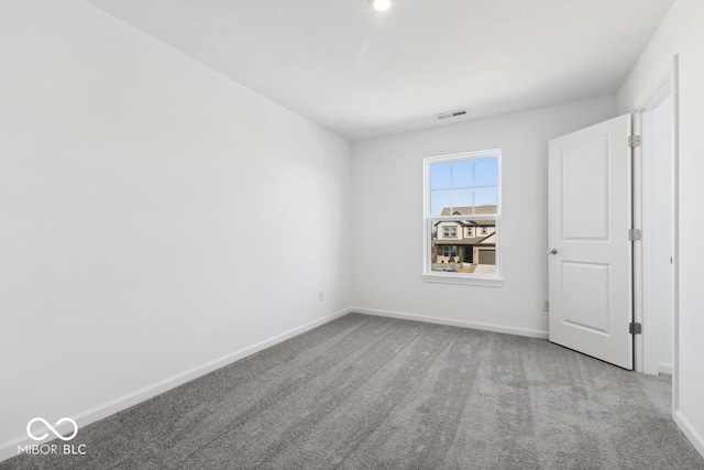 1924 White Oak Dr, Shelbyville, IN 46176 - unfurnished bedroom featuring carpet floors, visible vents, and baseboards
