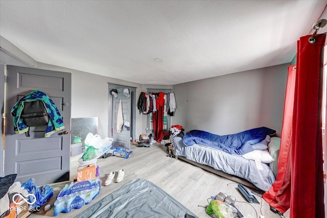 215 S Warman Ave, Indianapolis, IN 46222 - bedroom with wood finished floors