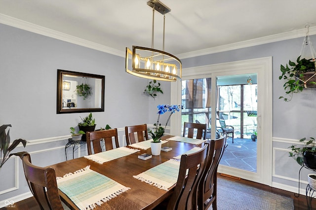 6820 W Forest Brook Dr, Fountaintown, IN 46130 - dining area with crown molding, dark wood-style floors, and a chandelier
