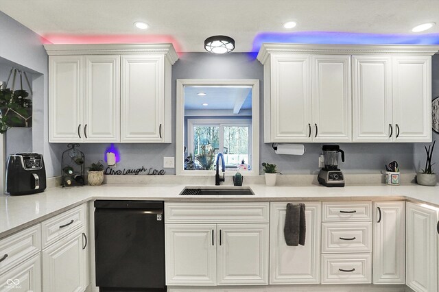 6820 W Forest Brook Dr, Fountaintown, IN 46130 - kitchen featuring dishwasher, a sink, white cabinets, light countertops, and recessed lighting