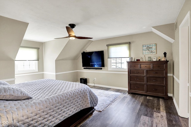 6820 W Forest Brook Dr, Fountaintown, IN 46130 - bedroom with multiple windows, dark wood-style floors, vaulted ceiling, baseboards, and ceiling fan
