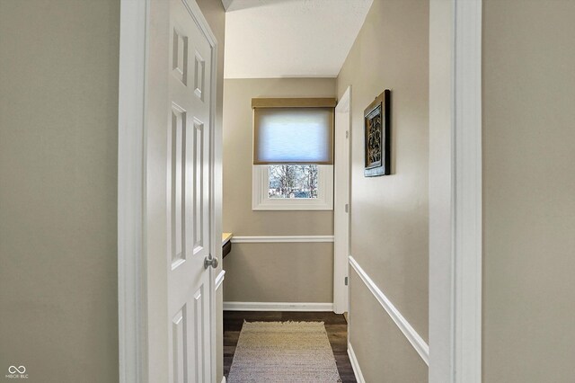 6820 W Forest Brook Dr, Fountaintown, IN 46130 - entryway featuring dark wood-type flooring and baseboards