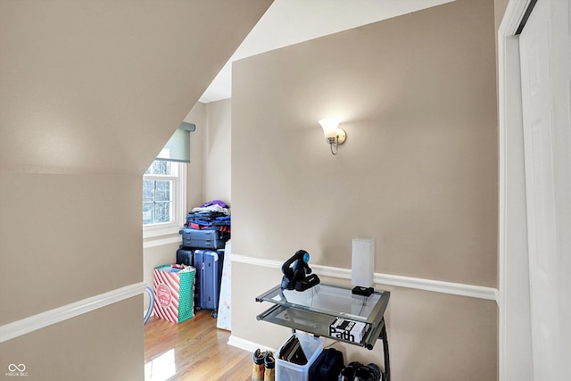 6820 W Forest Brook Dr, Fountaintown, IN 46130 - home office featuring wood finished floors, baseboards, and lofted ceiling