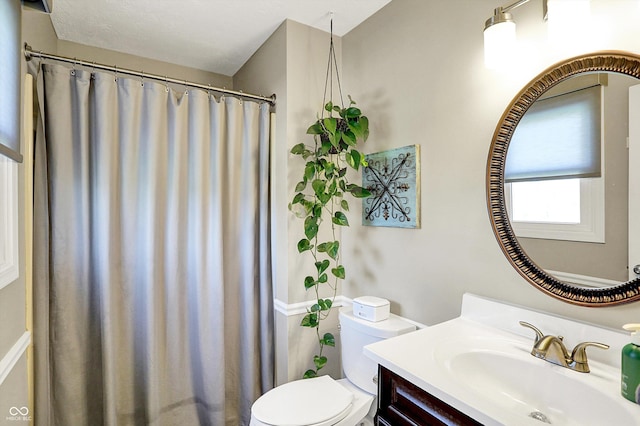 6820 W Forest Brook Dr, Fountaintown, IN 46130 - bathroom featuring vanity, toilet, and curtained shower