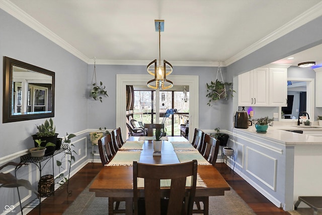 6820 W Forest Brook Dr, Fountaintown, IN 46130 - dining space featuring dark wood finished floors and ornamental molding