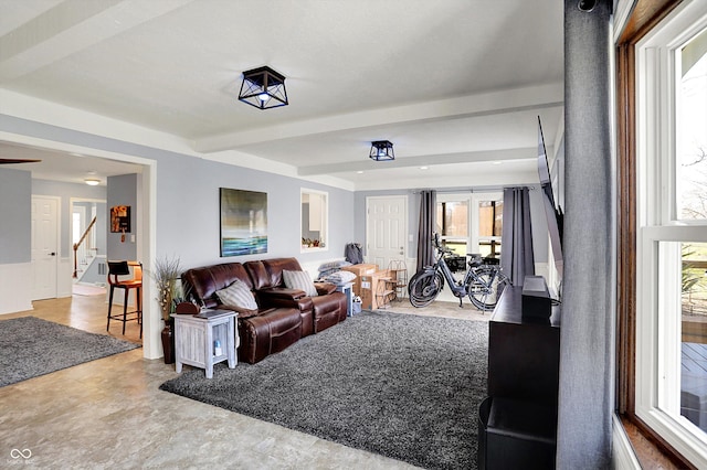 6820 W Forest Brook Dr, Fountaintown, IN 46130 - living area with stairs, plenty of natural light, and beamed ceiling