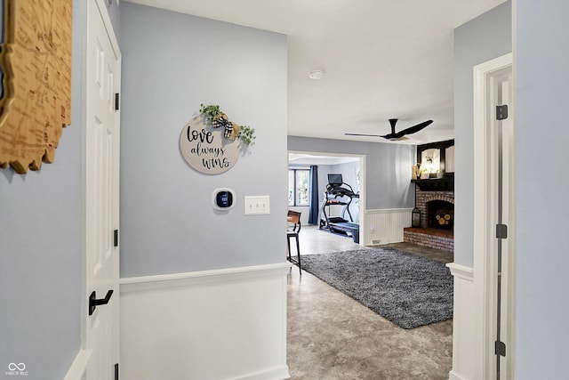 6820 W Forest Brook Dr, Fountaintown, IN 46130 - hallway with finished concrete flooring and wainscoting
