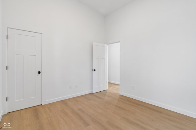2362 English Ave, Indianapolis, IN 46201 - spare room with baseboards and light wood-type flooring
