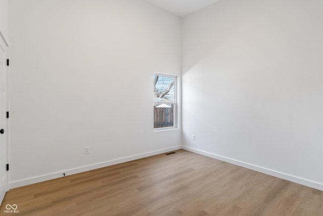 2362 English Ave, Indianapolis, IN 46201 - empty room with light wood-style flooring, baseboards, and visible vents